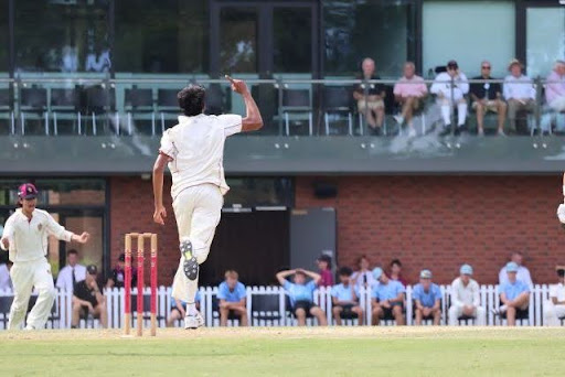 Tank celebrates after taking a wicket against GGS